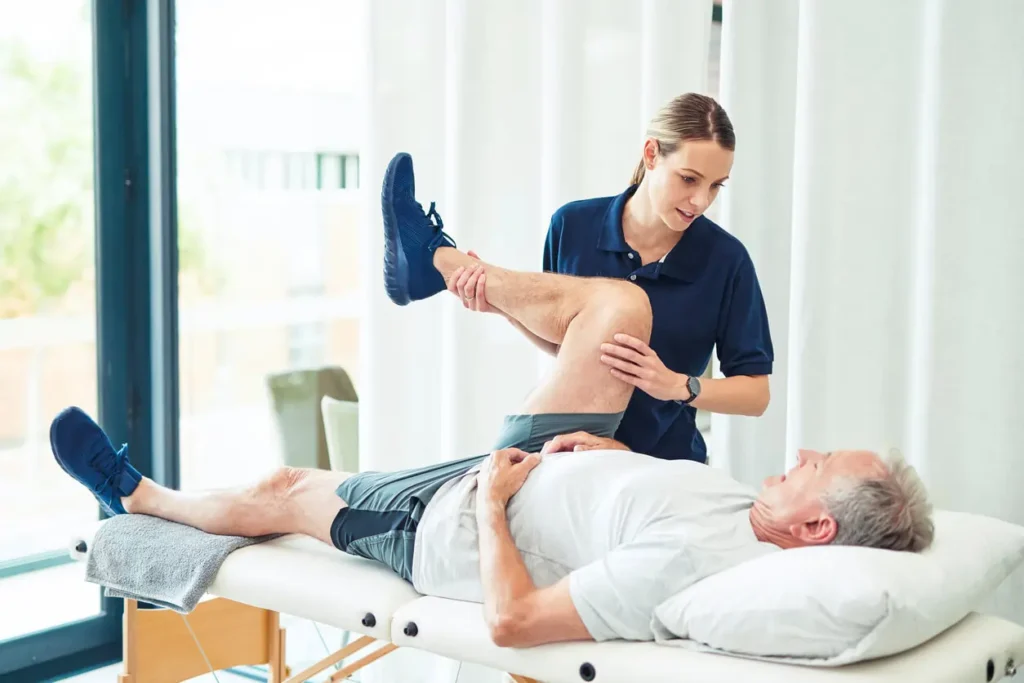Revitalising Recovery: Effective Rehabilitation Strategies for Muscle Injuries 3 Physiotherapist assisting a patient with muscle recovery exercises Westcliff-on-Sea