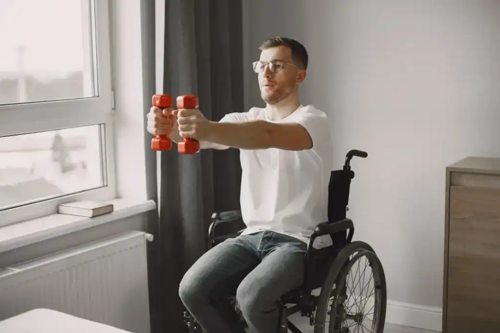 Empowering Weight Loss: A Comprehensive Guide for Individuals with Disabilities 1 Image of man doing exercise in his wheelchair to aid weight loss Westcliff-on-Sea