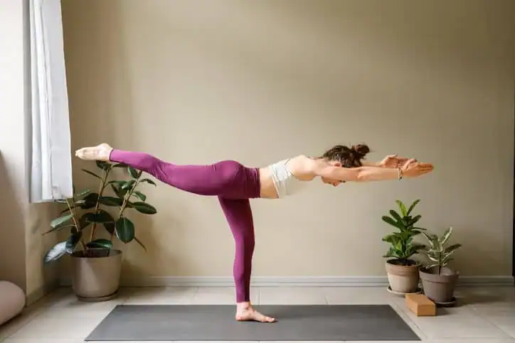 Achieving the Perfect Tone: How Often Should You Exercise for Results? 1 Woman doing Yoga exercise Westcliff-on-Sea to help with toning the body.