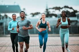 Sculpting Sleek Arms: The Essential Role of Cardio in Toning Without Bulking Up 3 image of people running to incorporate cardio Westcliff-on-Sea exercise into their life to help tone arms and body.
