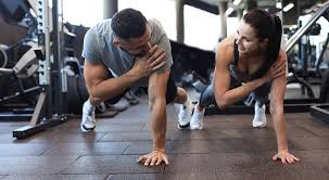 Sculpting Sleek Arms: The Essential Role of Cardio in Toning Without Bulking Up 1 Image of man and woman doing Cardio Westcliff-on-Sea to tone their arms.